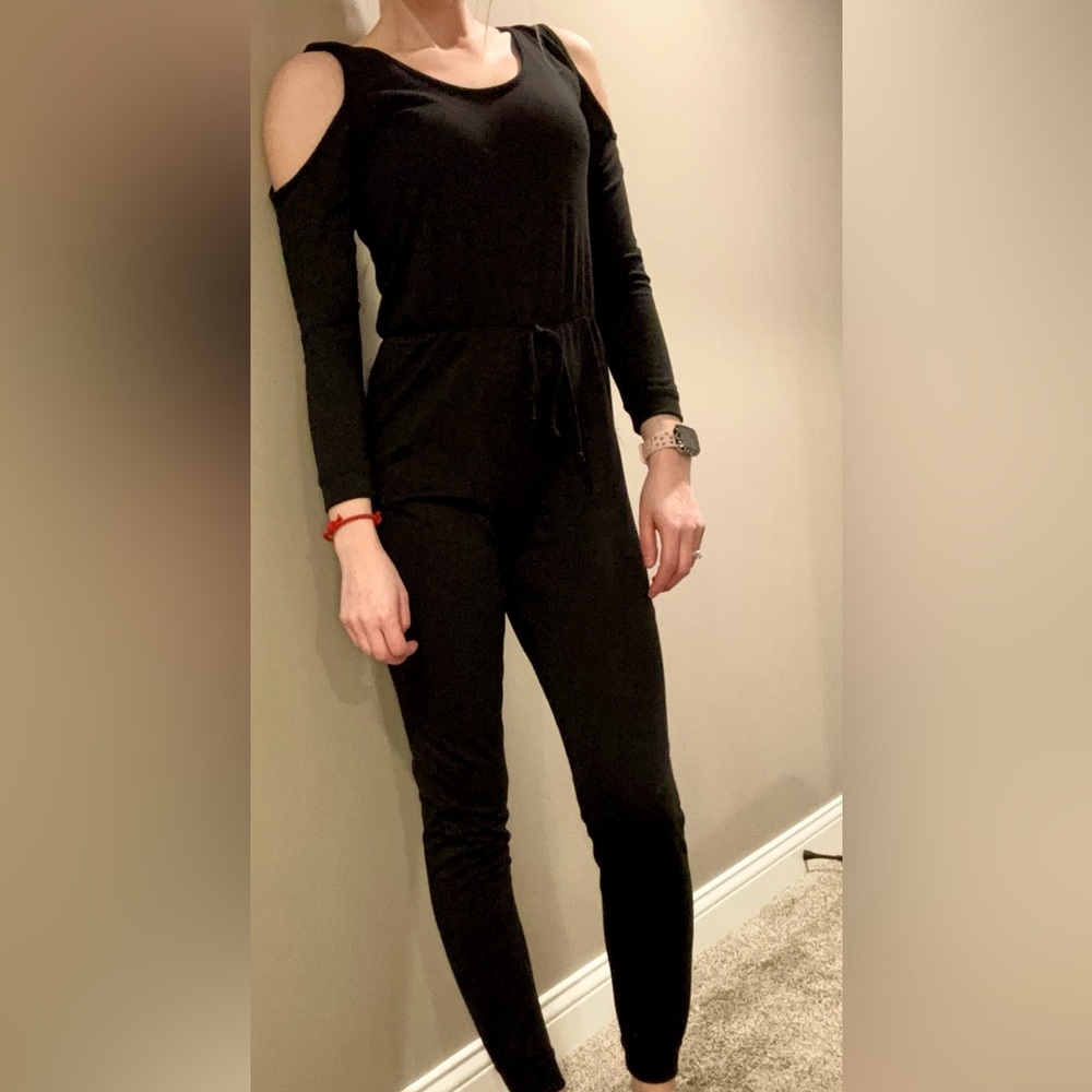 Venus XS romper with shoulder slits.